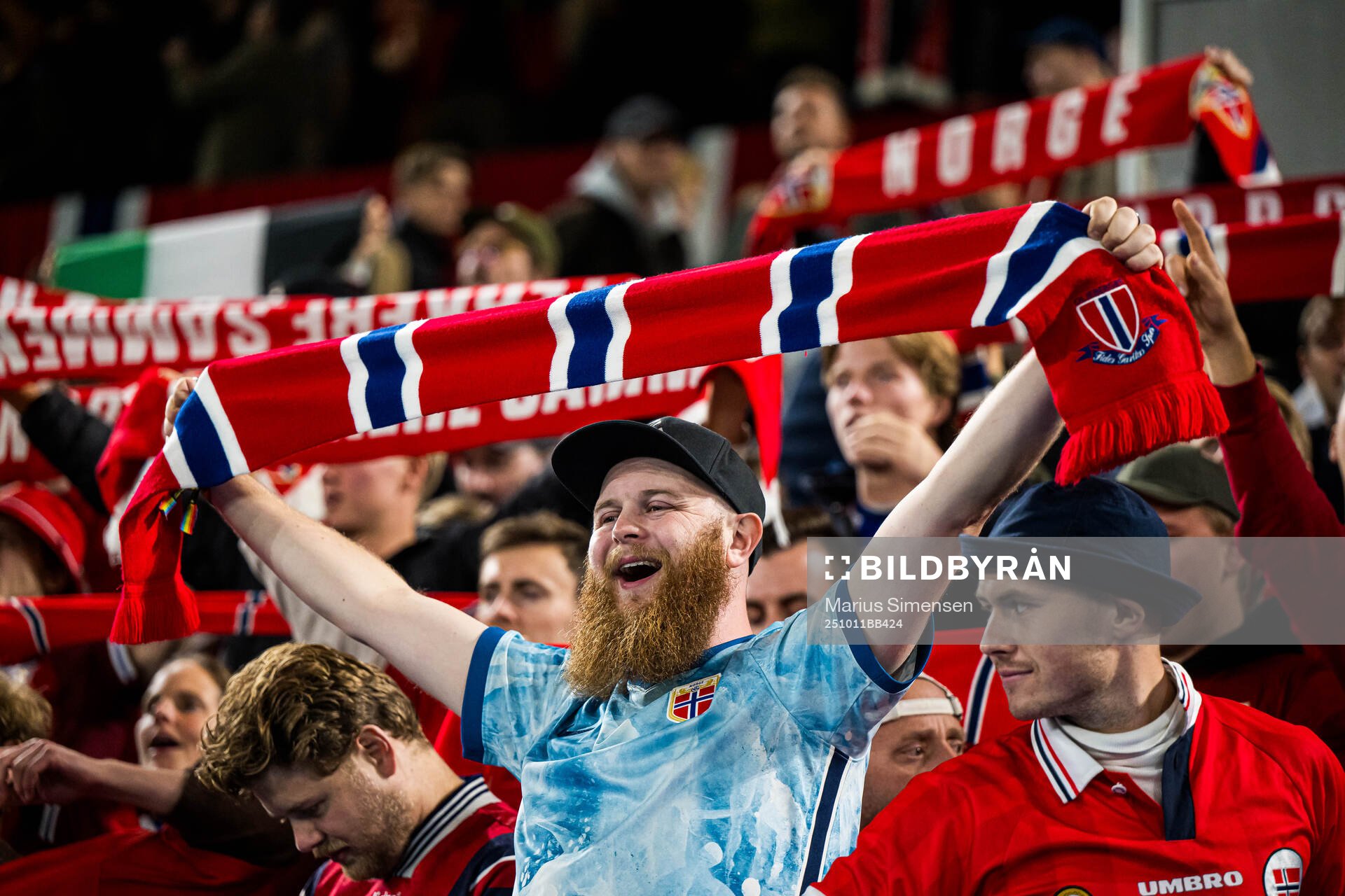 Spectators in the stands celebrates