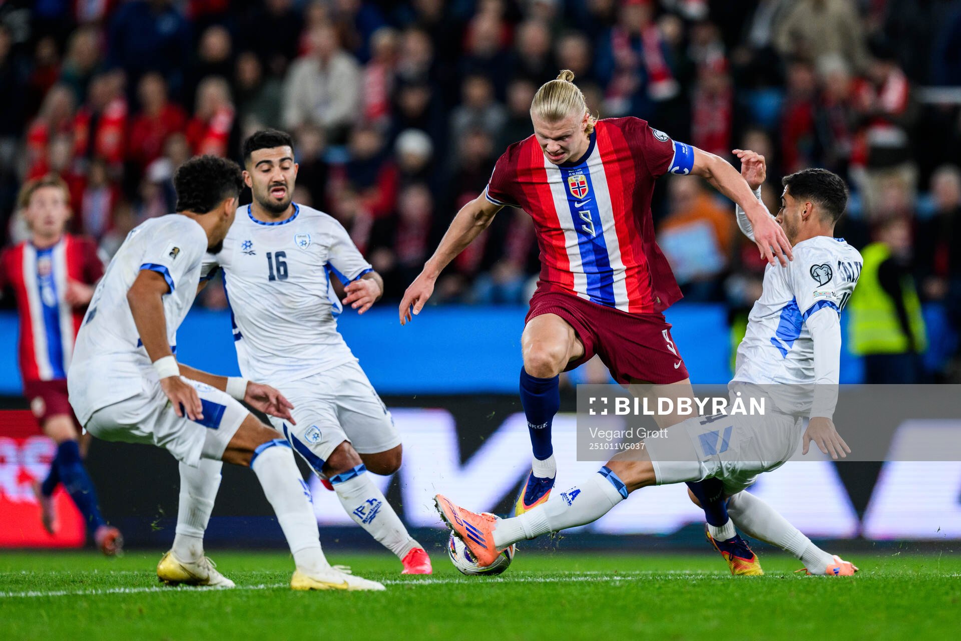Erling Braut Haaland of Norway and Matan Baltaxa of Israel