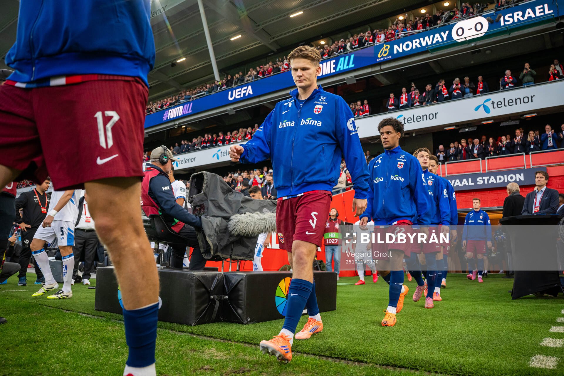 David Møller Wolfe of Norway enters the pitch