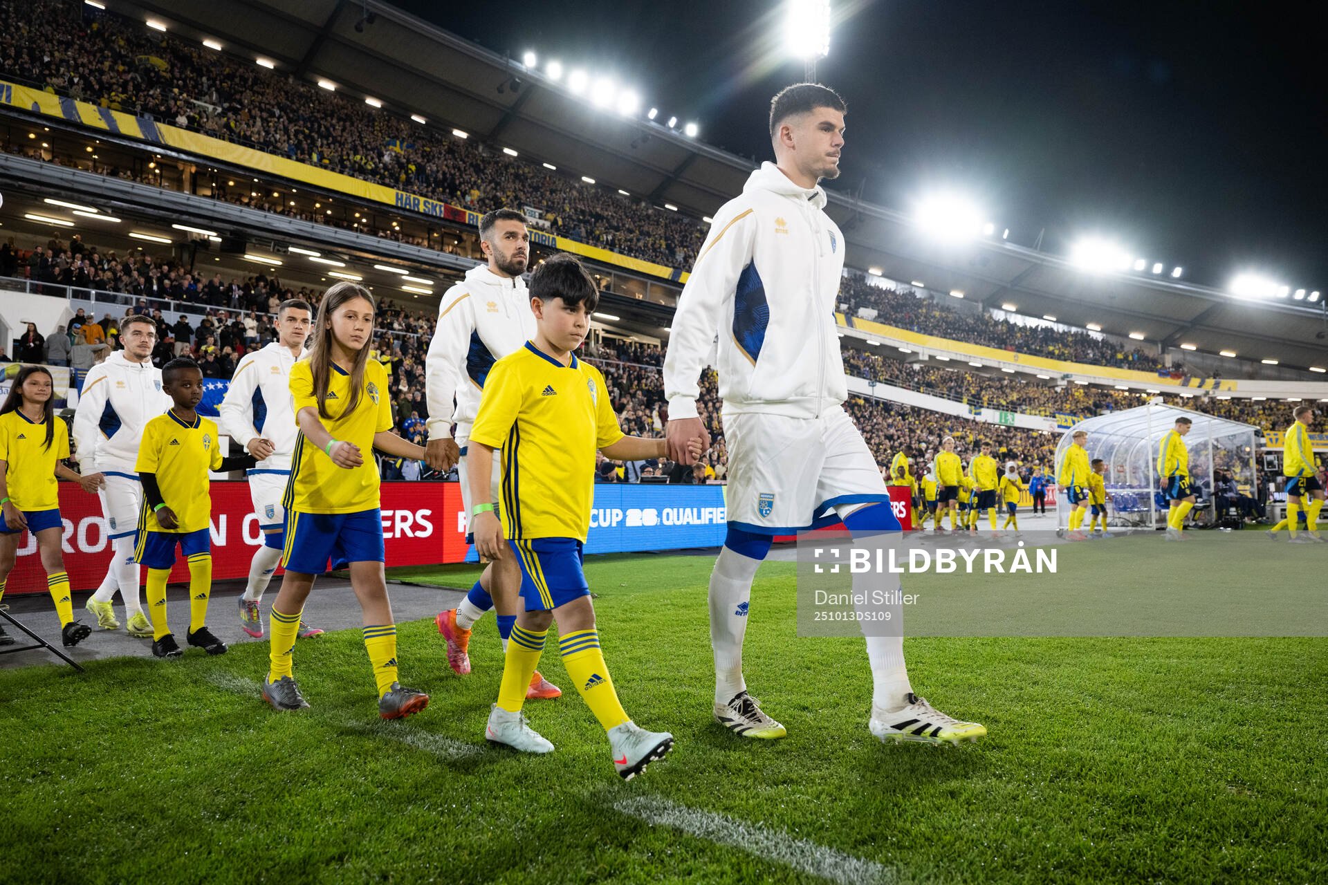 Mascots with players of Kosovo