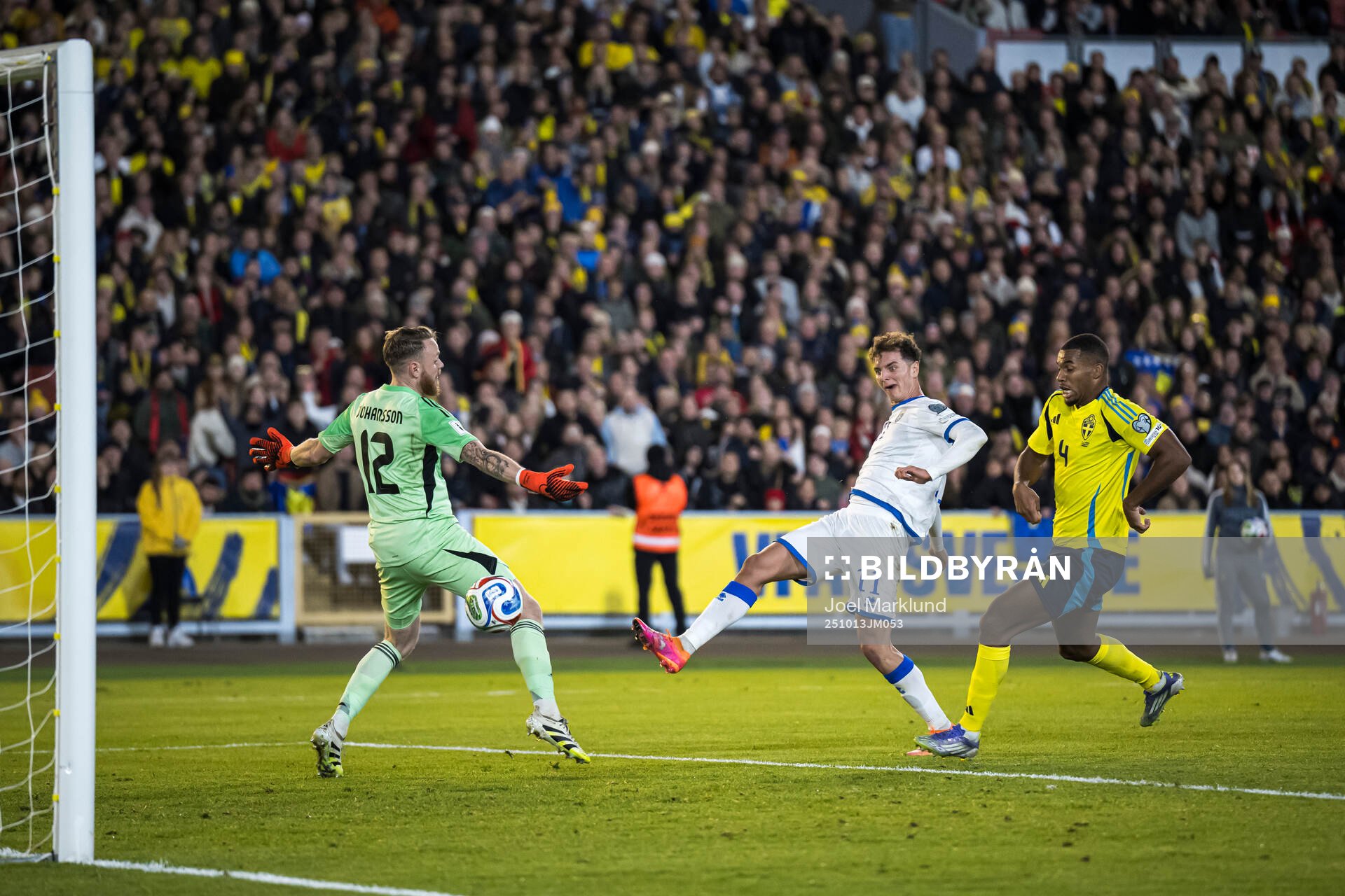 Fisnik Asllani of Kosovo scores the 0-1 goal behind