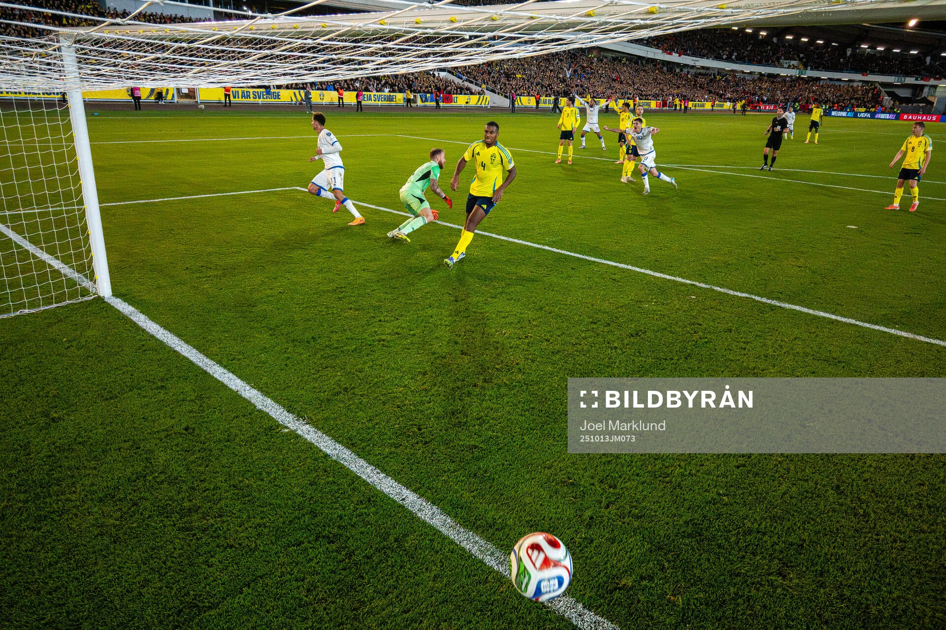 Fisnik Asllani of Kosovo scores 0-1 behind goalkeeper
