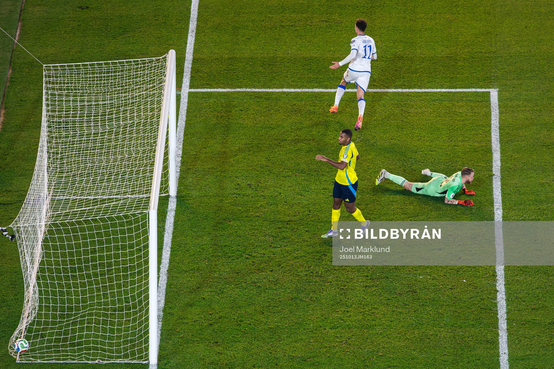 Fisnik Asllani of Kosovo celebrates
