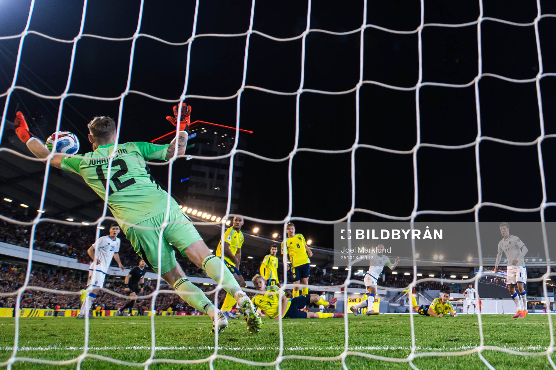 Goalkeeper Viktor Johansson of Sweden reaches for the ball