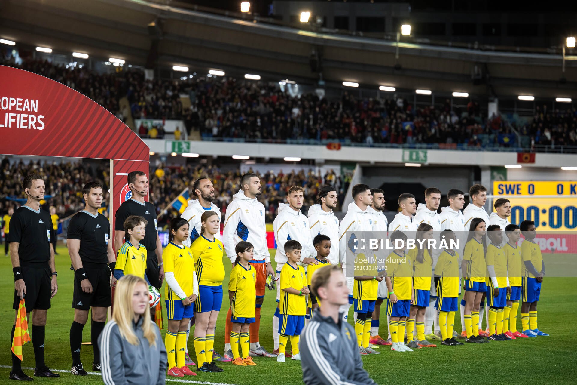 Mascots in front of the Kosovo players