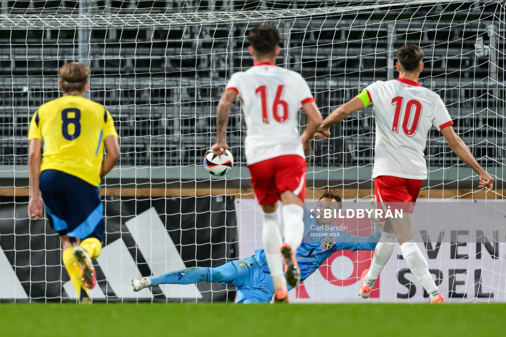 Tomasz Pienko of Poland scores the 0-2 goal