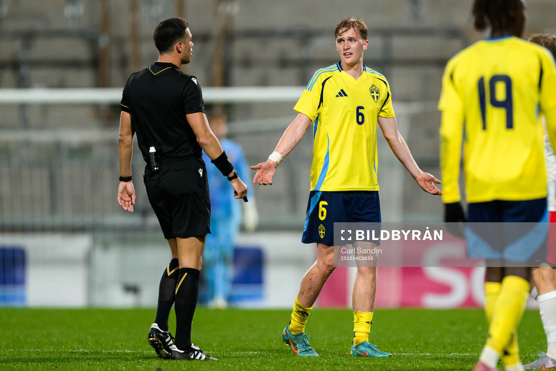Referee Oguzhan Çakir and Olle Samuelsson of Sweden