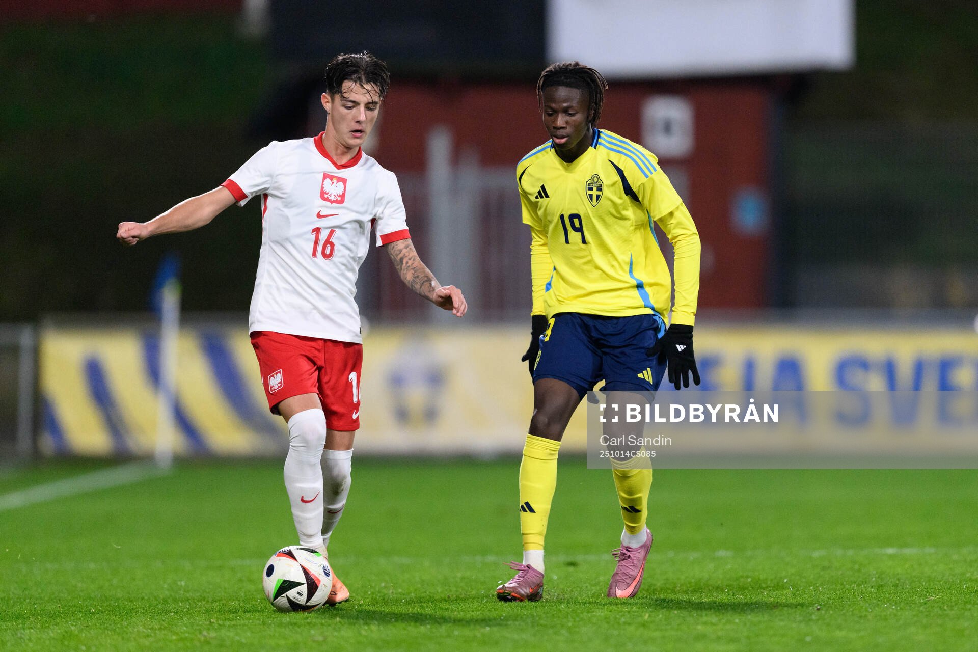 Kacper Urbanski of Poland and Alieu Njie of Sweden