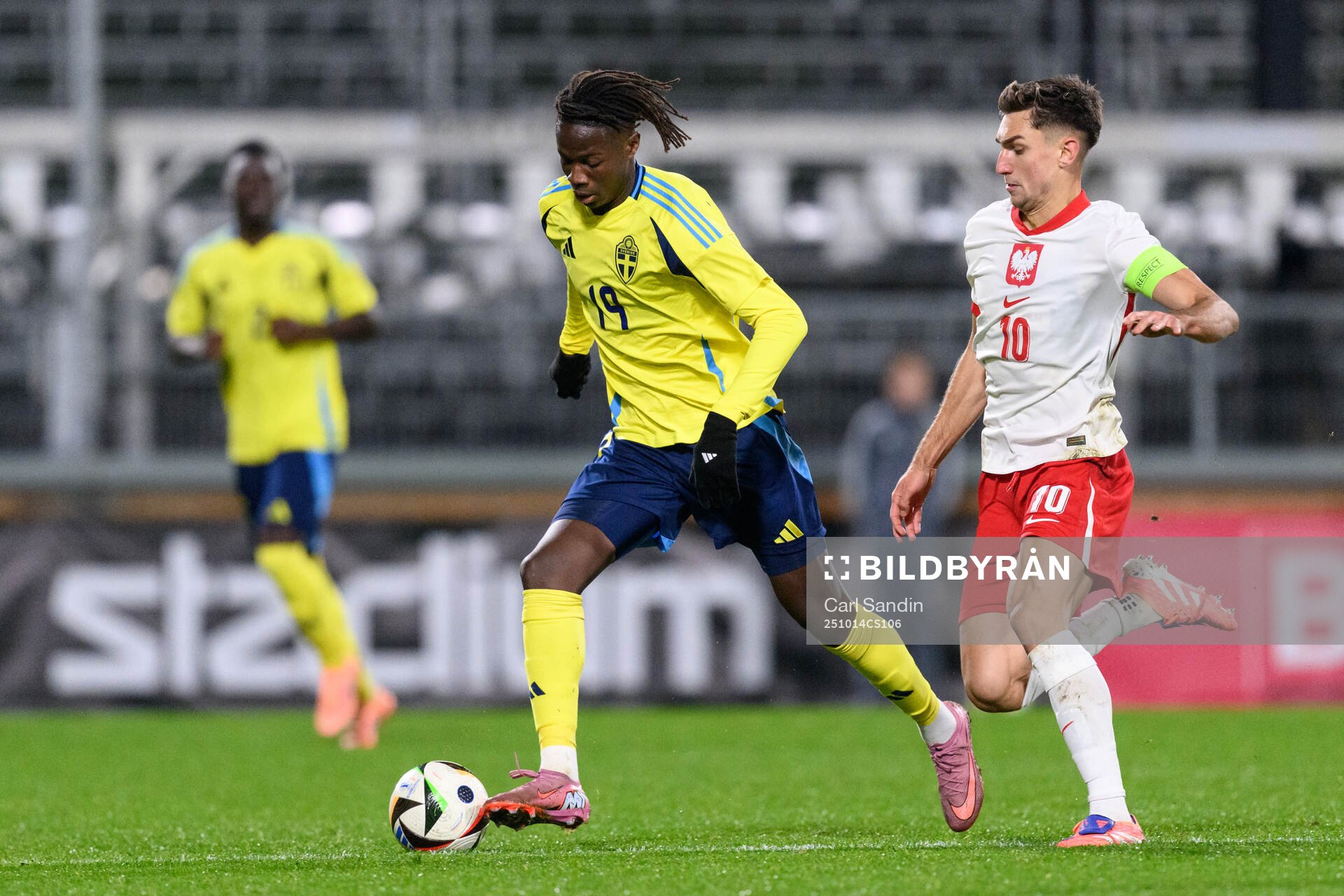 Alieu Njie of Sweden and Tomasz Pienko of Poland