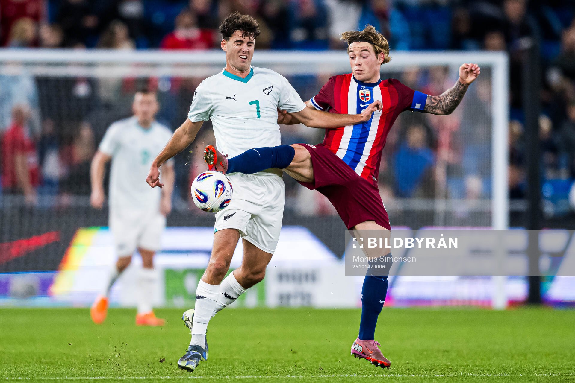 Matt Garbett of New Zealand and Patrick Berg of Norway