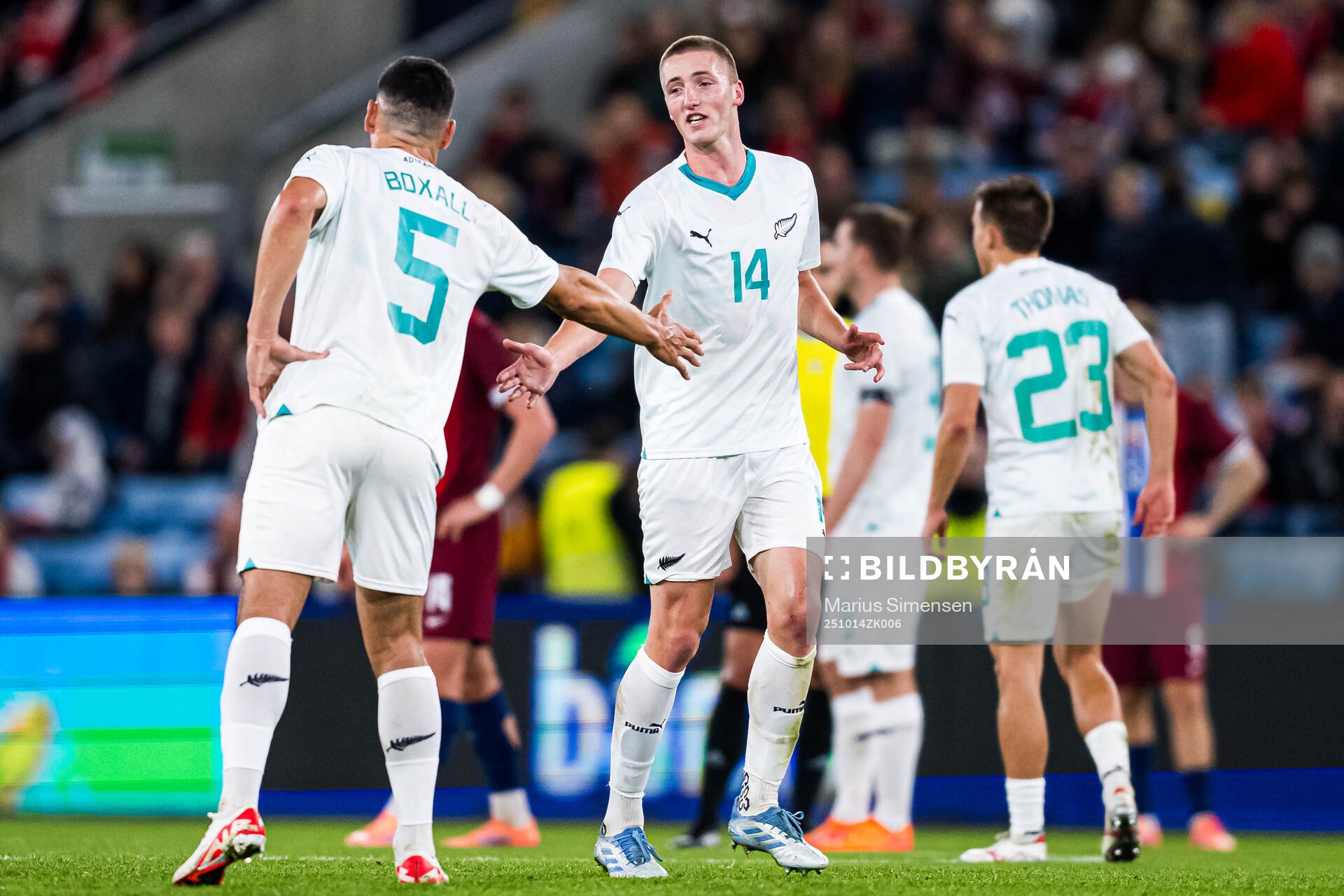 Finn Surman of New Zealand celebrates