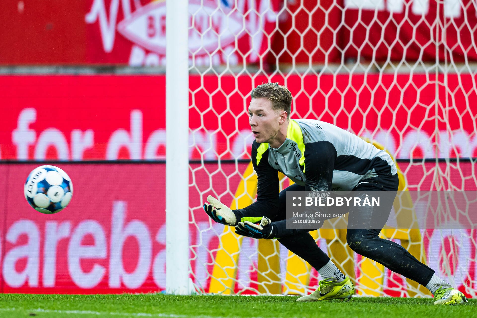 Goalkeeper Mathias Dyngeland of Brann warms up