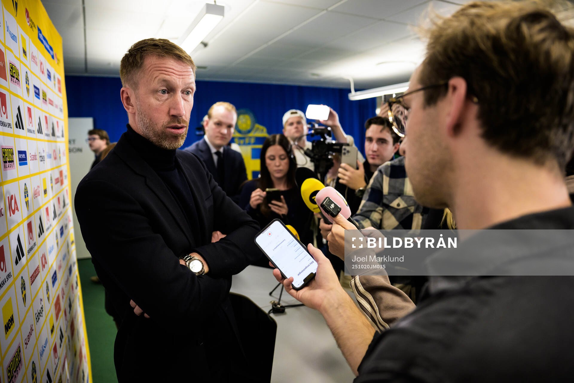 Graham Potter is being interviewed by media