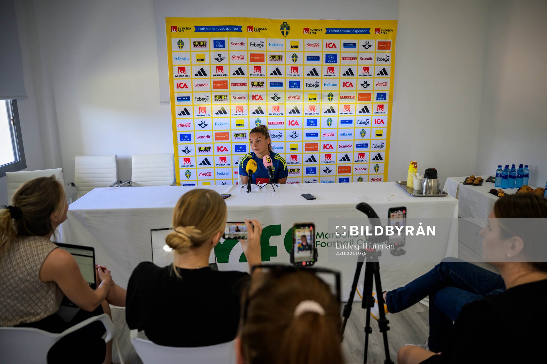 Johanna Rytting Kaneryd is interviewed by the media at a