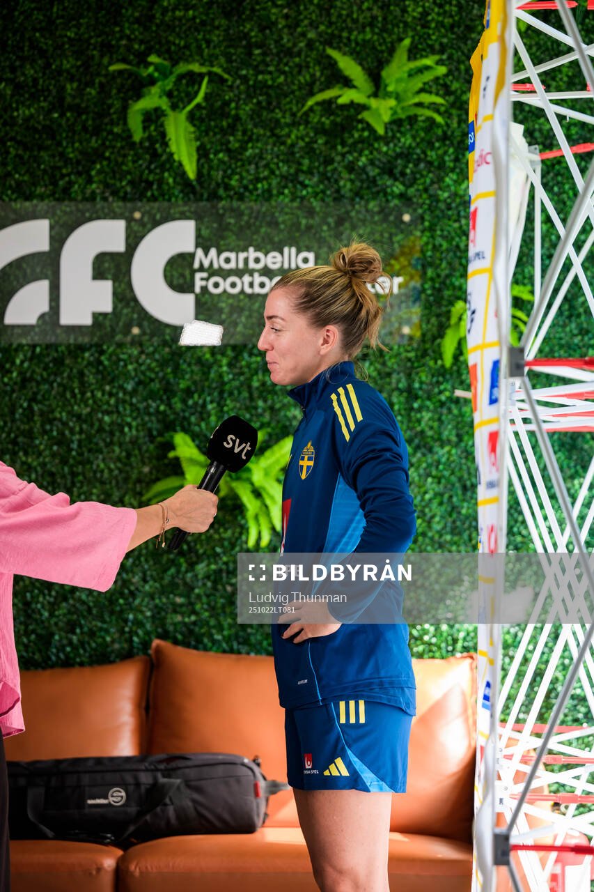 Linda Sembrant is interviewed by the media at a press event