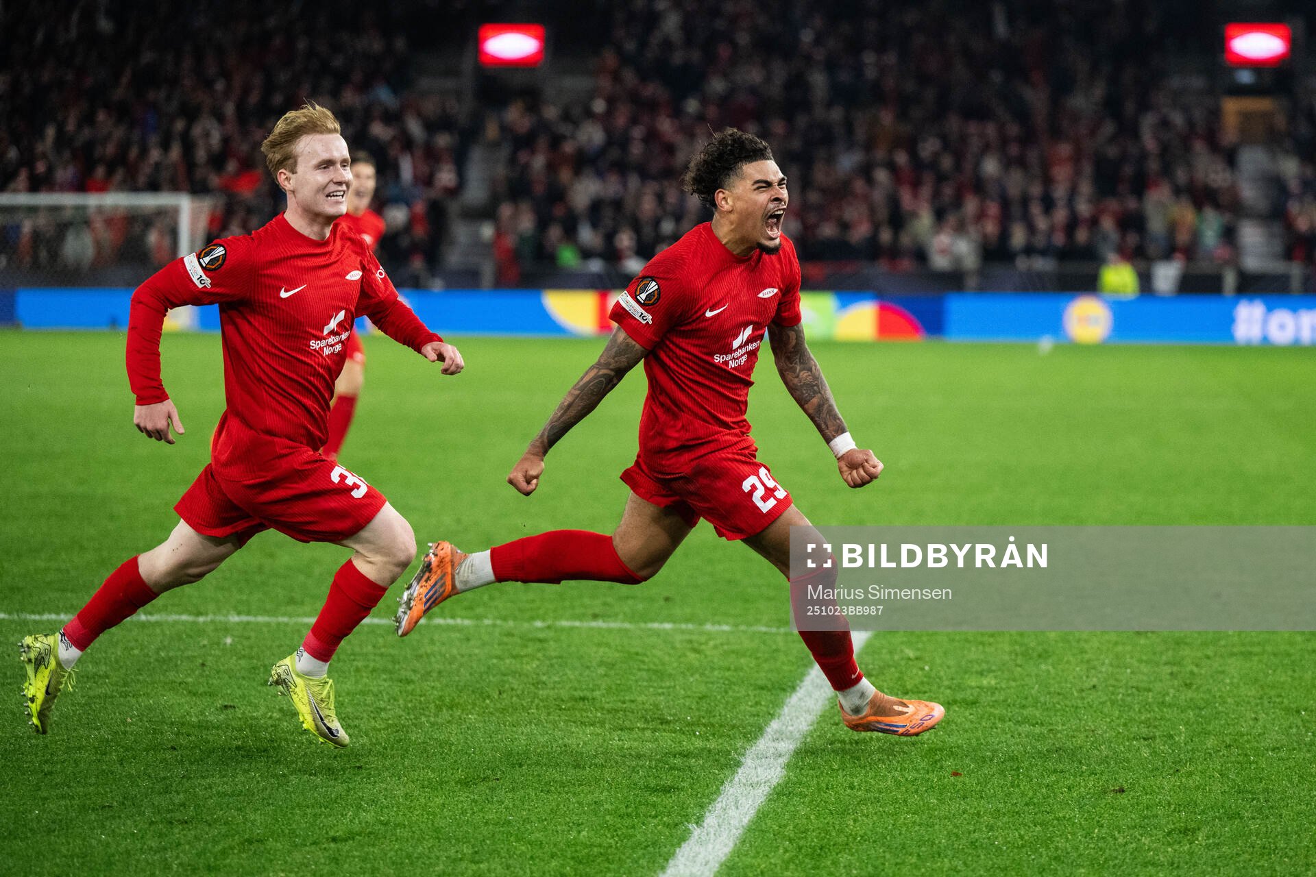 Noah Jean Holm of Brann celebrates with Markus Haaland