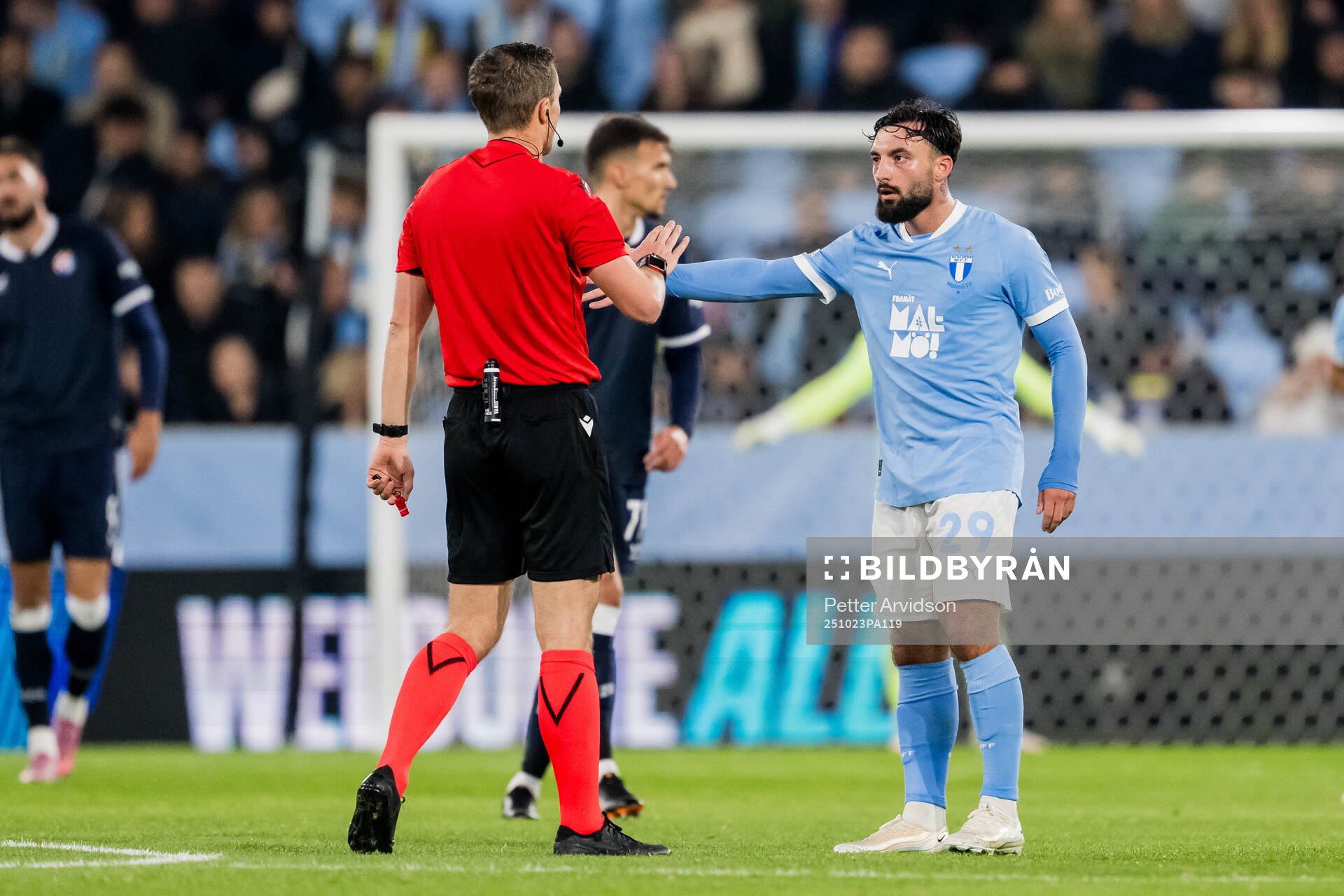Sead Haksabanovic of Malmö FF and Referee Willy Delajod
