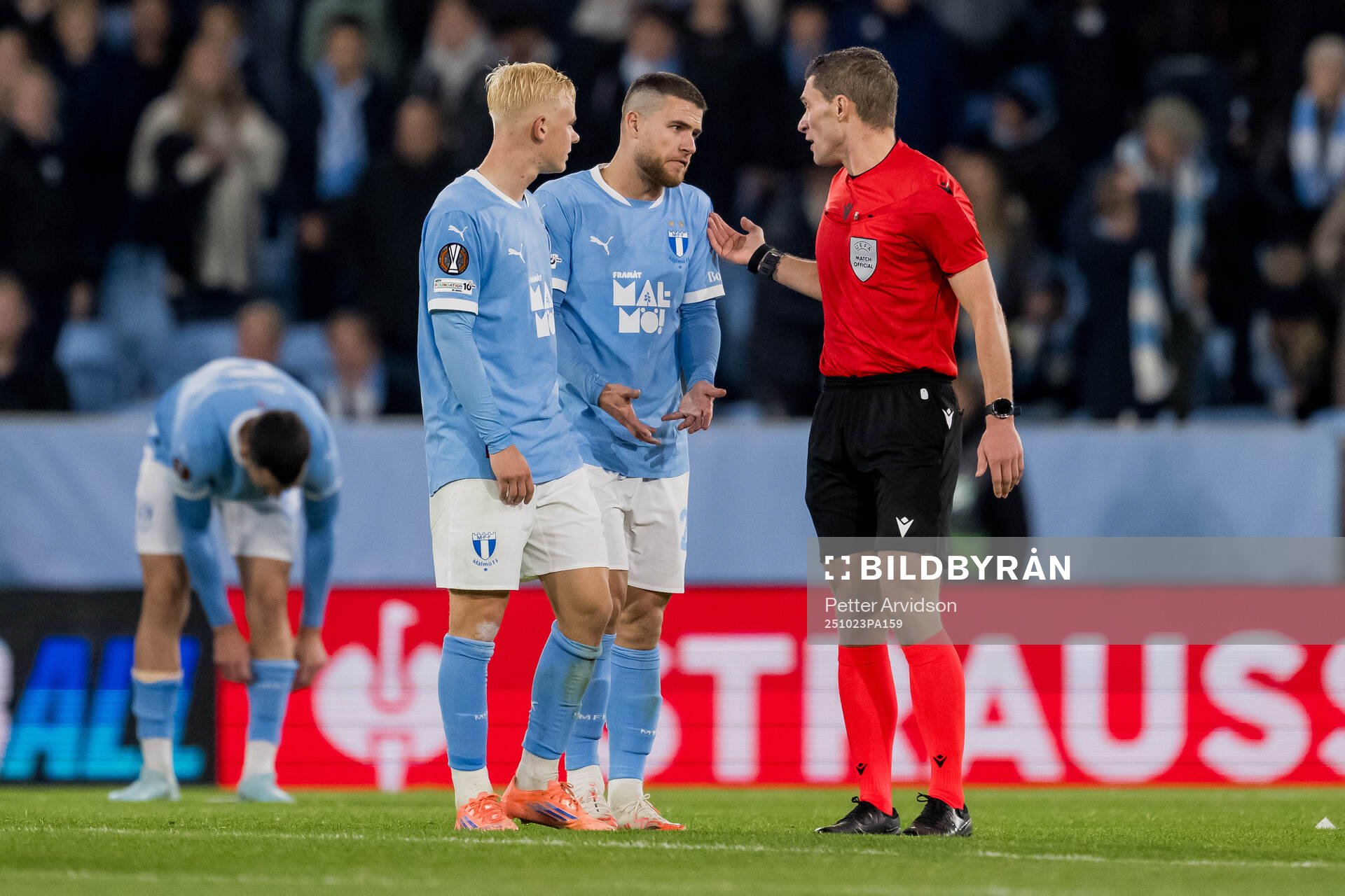 Otto Rosengren, Gabriel Busanello of Malmö FF and Referee