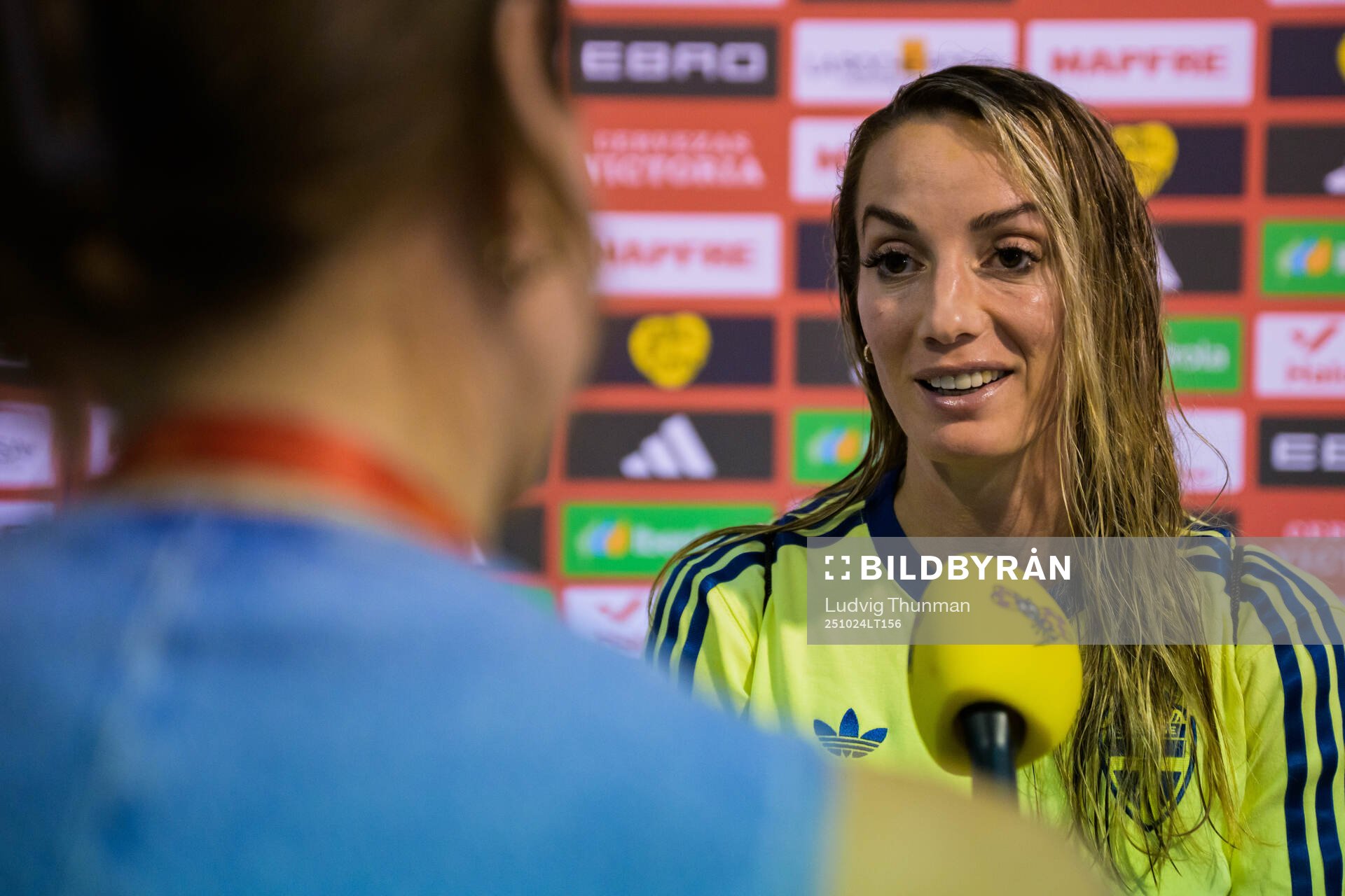 Kosovare Asllani of Sweden is interviewed by media