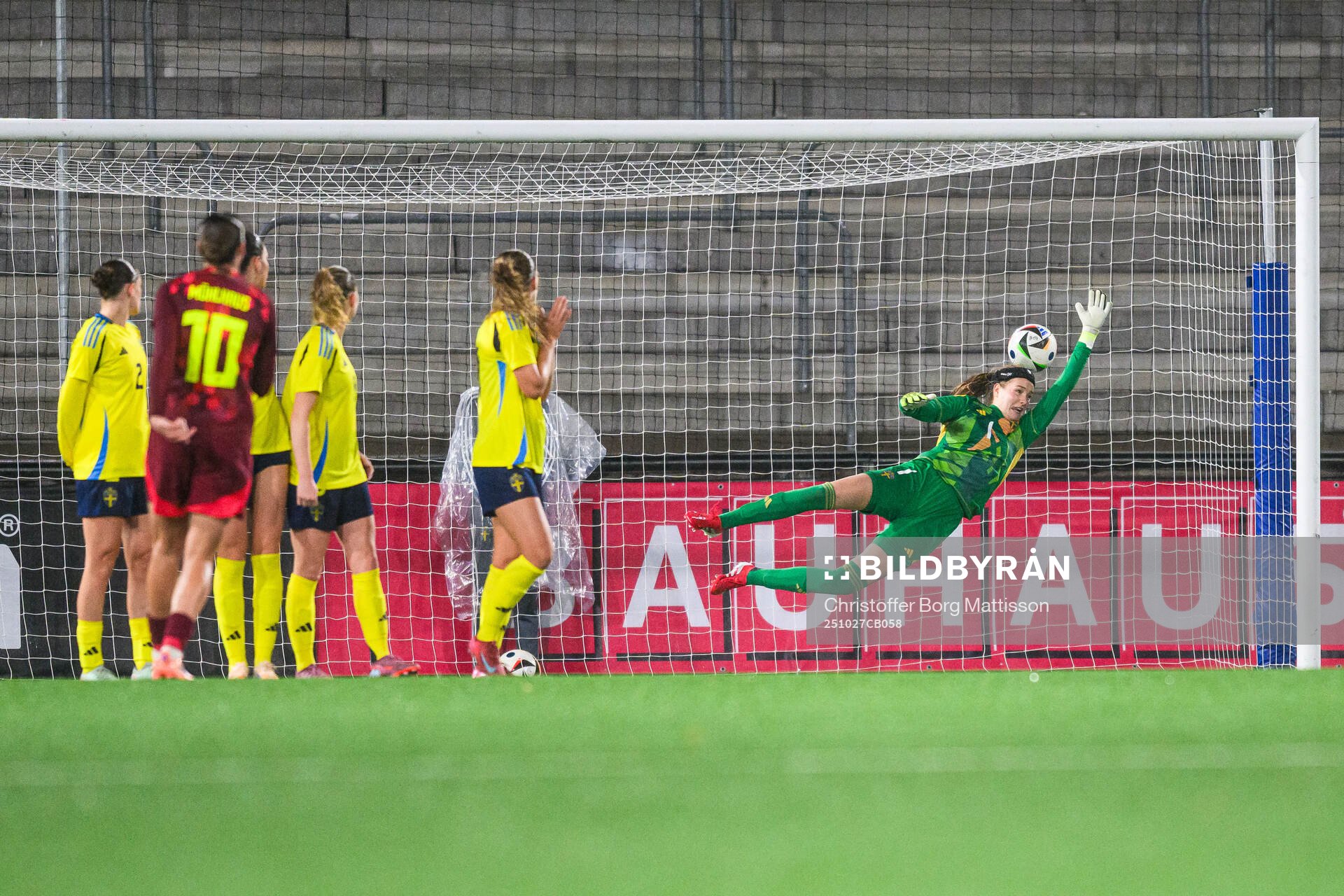 Larissa Muhlhaus of Germany scores 0-1 behind goalkeeper