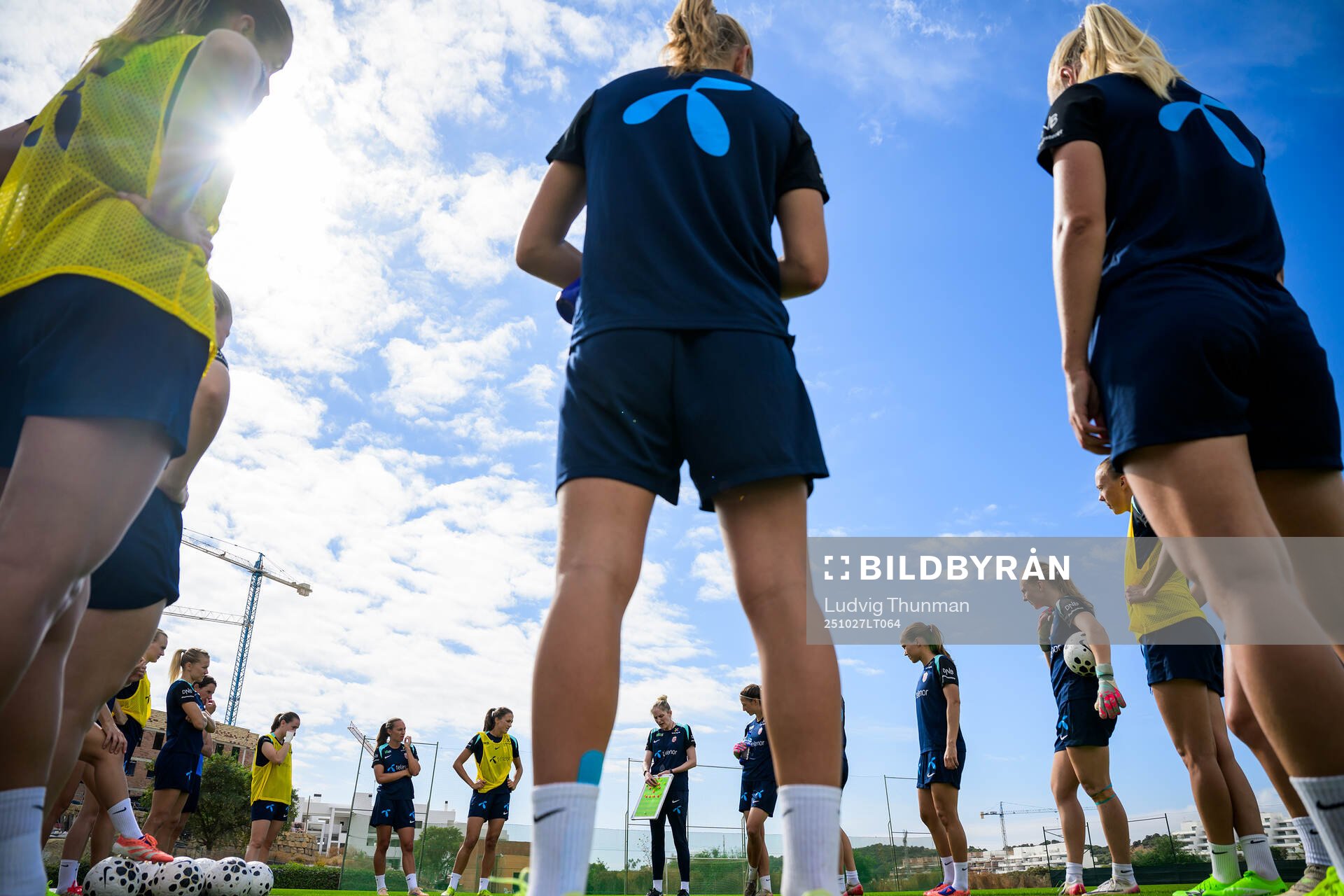 Players gather around head coach Gemma Grainger