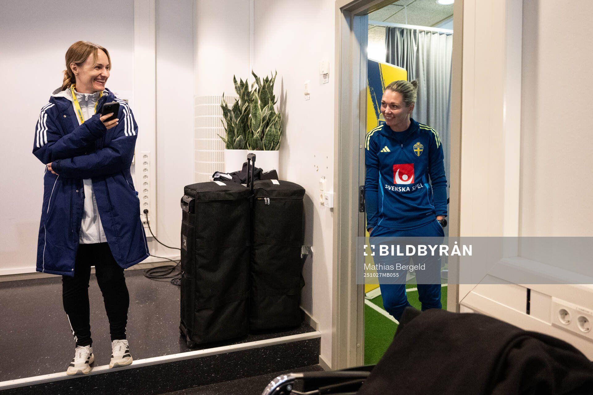 Press officer Lisa Eskils and goalkeeper Jennifer Falk of