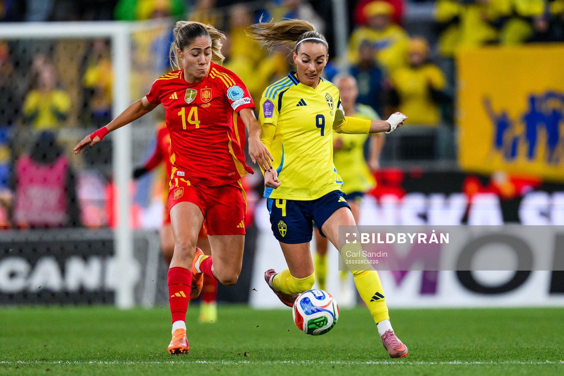Laia Aleixandri of Spain and Kosovare Asllani of Sweden