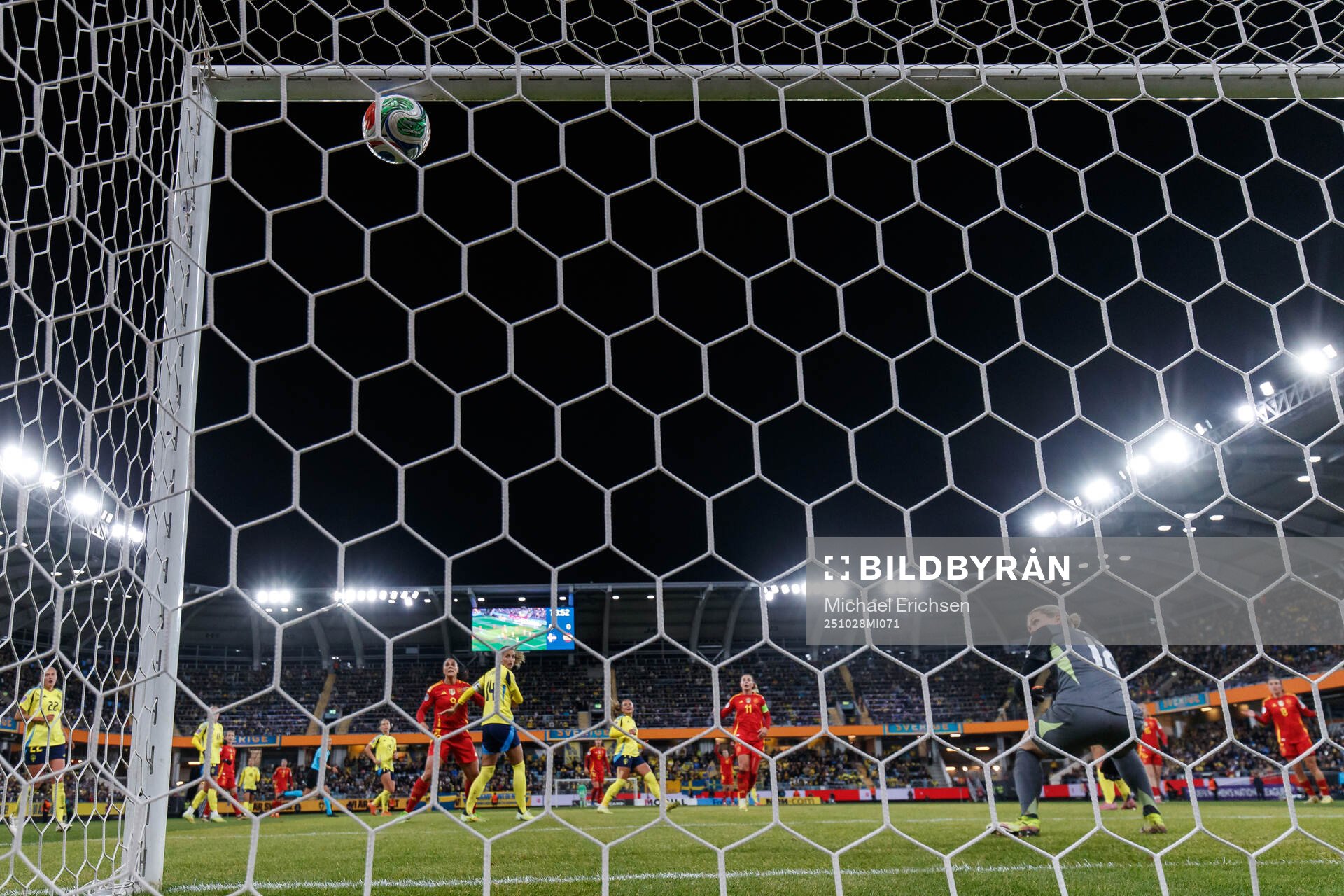 Alexia Putellas of Spain scores 0-1 behind goalkeeper
