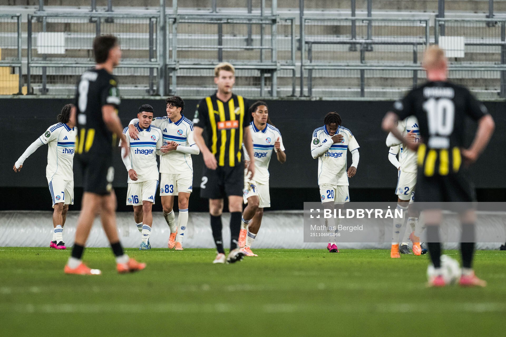 Martial Godo of Strasbourg celebrates with team mates