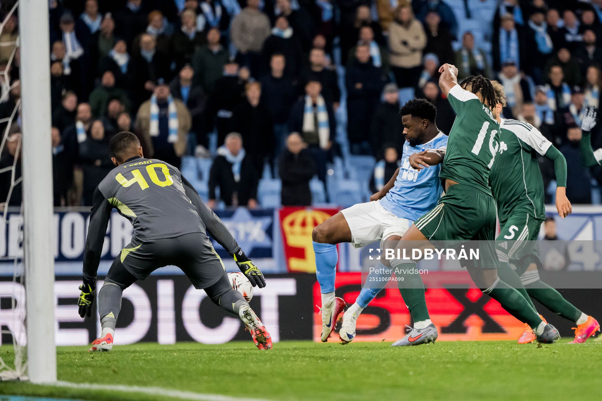 goalkeeper Alban Lafont of Panathinaikos and Emmanuel Ekong