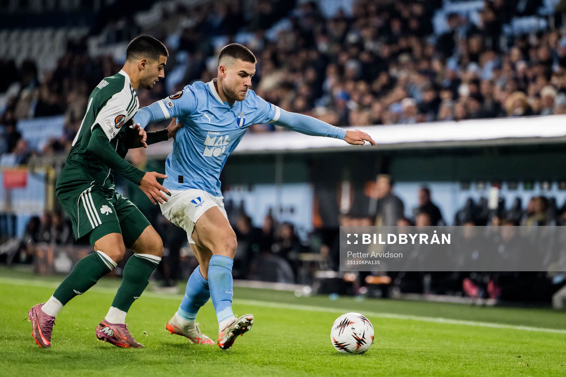 Giannis Kotsiras of Panathinaikos and Gabriel Busanello of