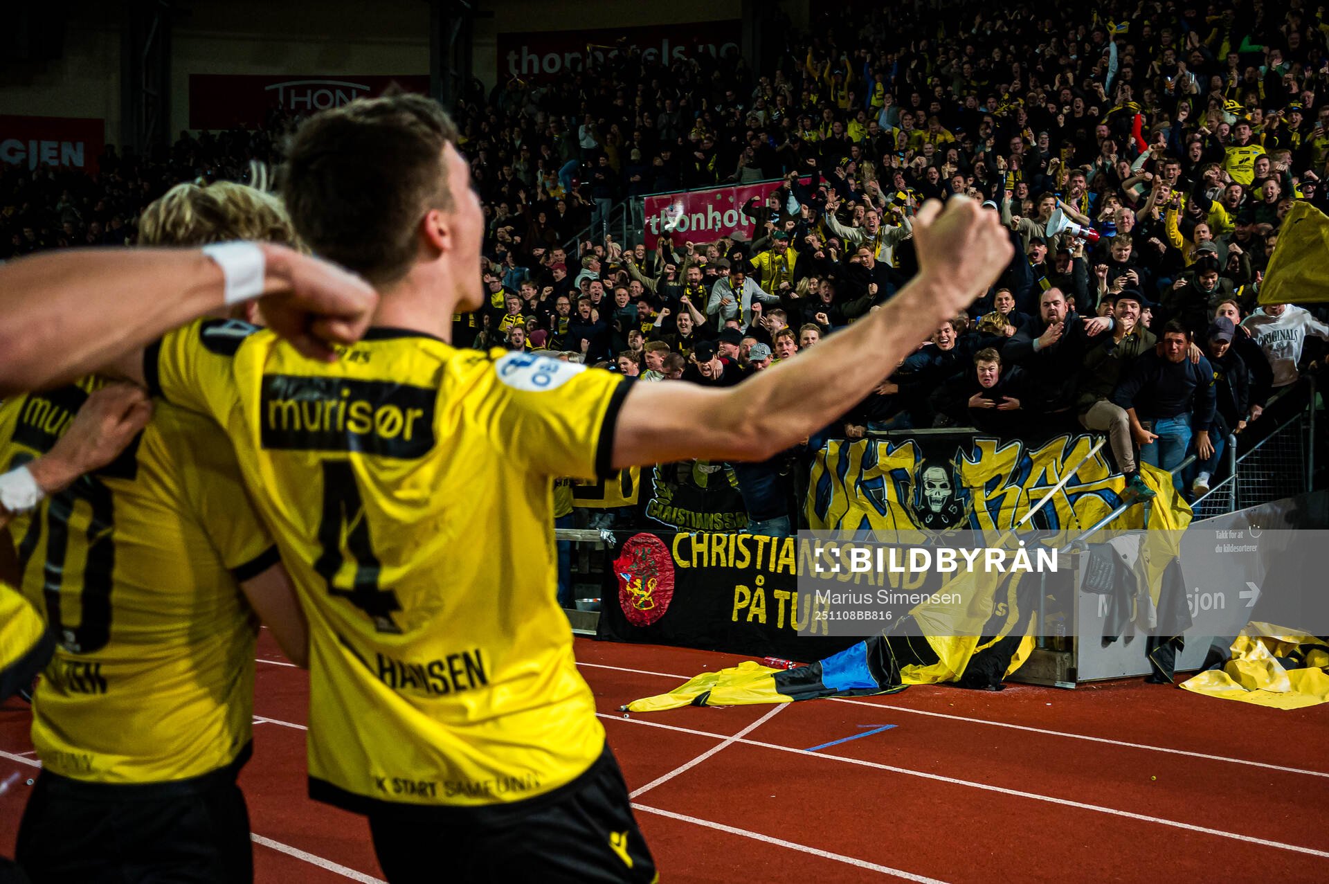 Spectators in the stands celebrates