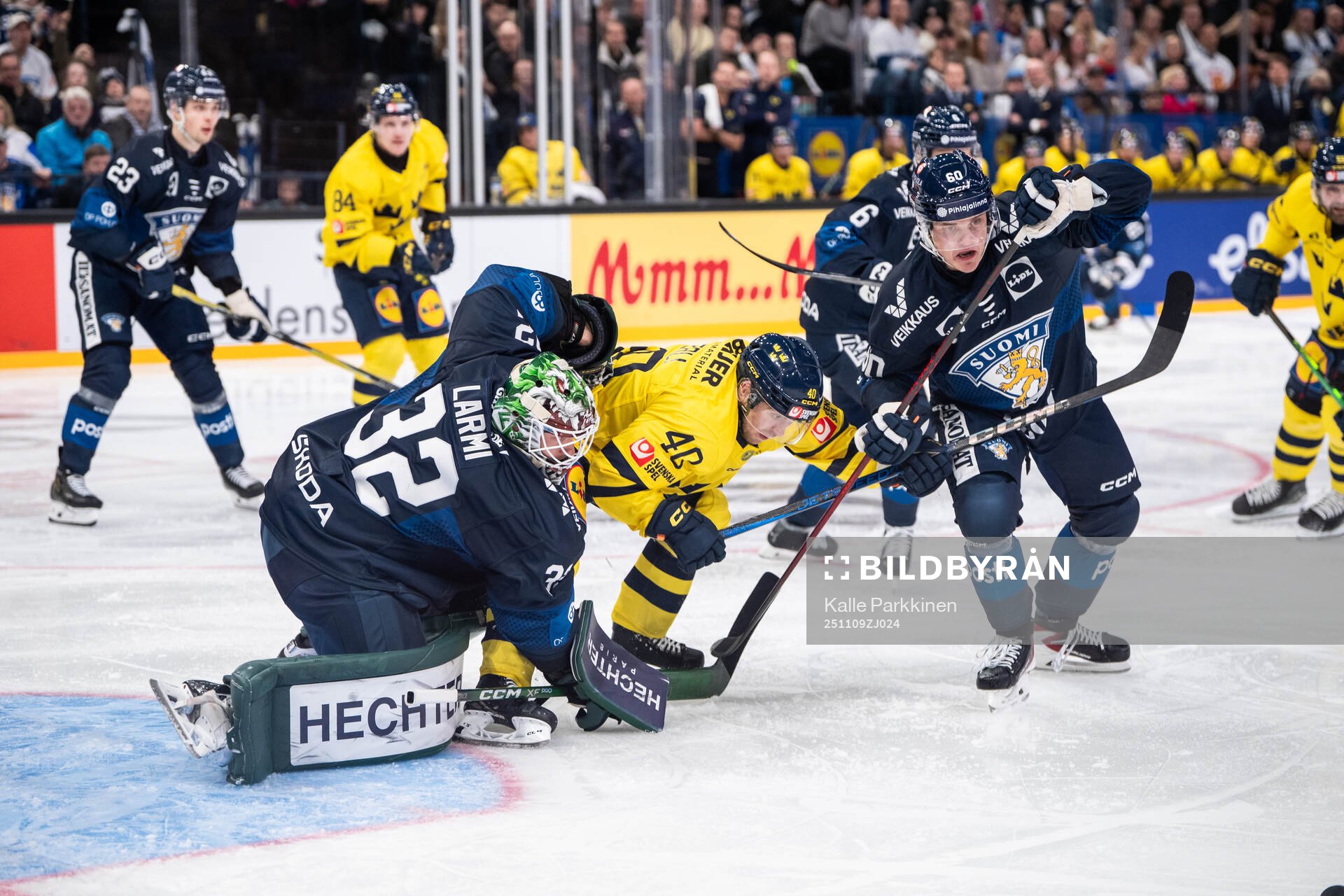 Emil Larmi and Julius Honka of Finland against Andreas