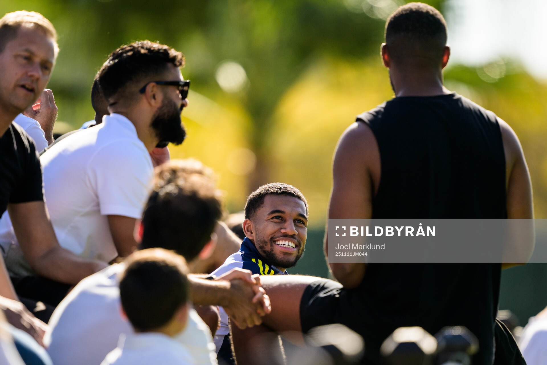 Isak Hien of the Swedish national football team interacting