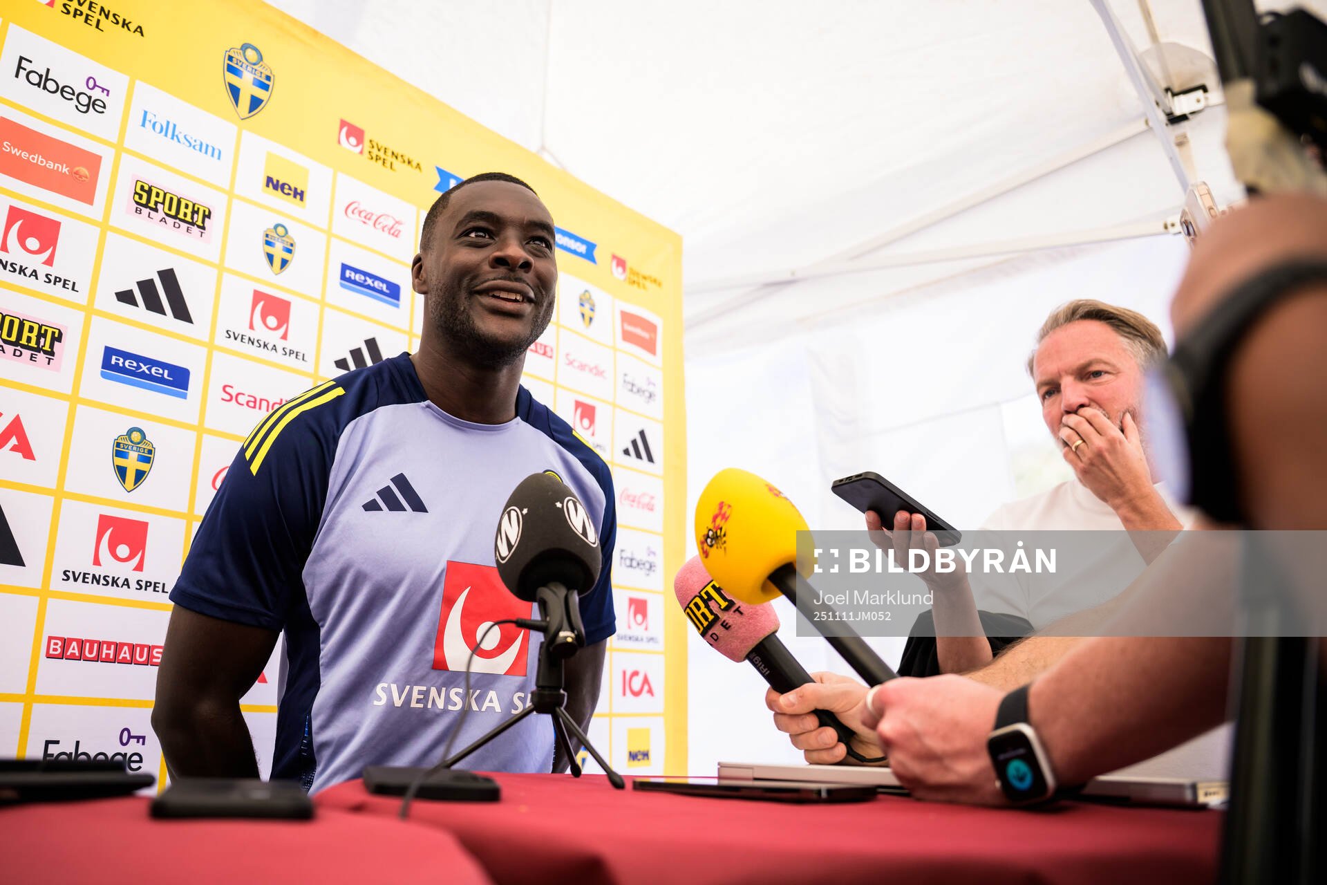 Ken Sema of the Swedish national football team talking to