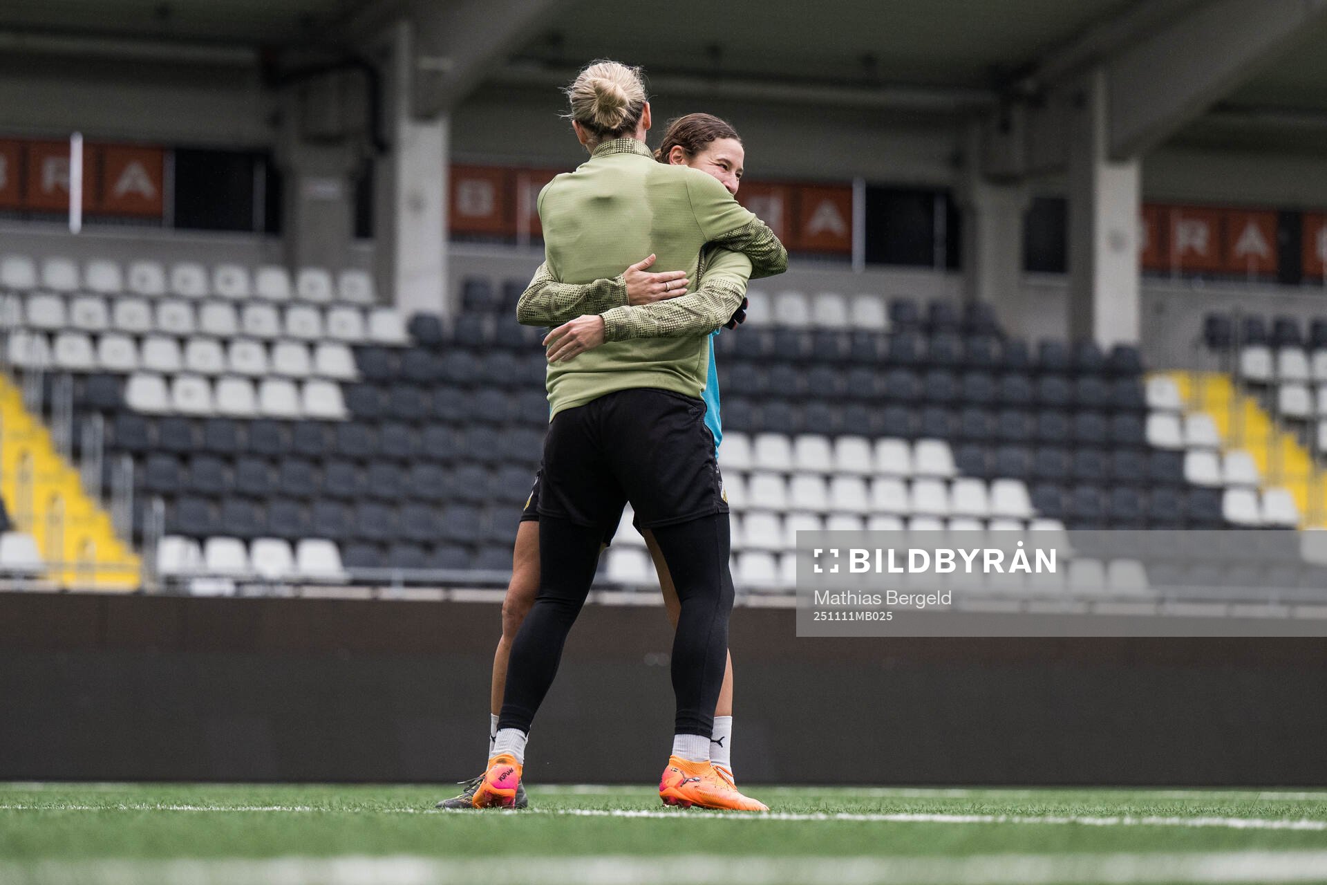 Goalkeeper Jennifer Falk and Tabby Tindell celebrates
