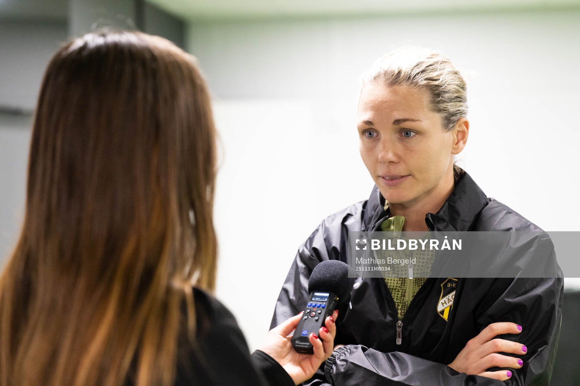 Goalkeeper Jennifer Falk is interviewed