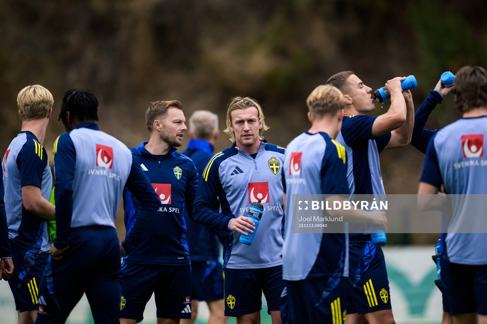 Assistant coach Sebastian Larsson and Emil Forsberg of the