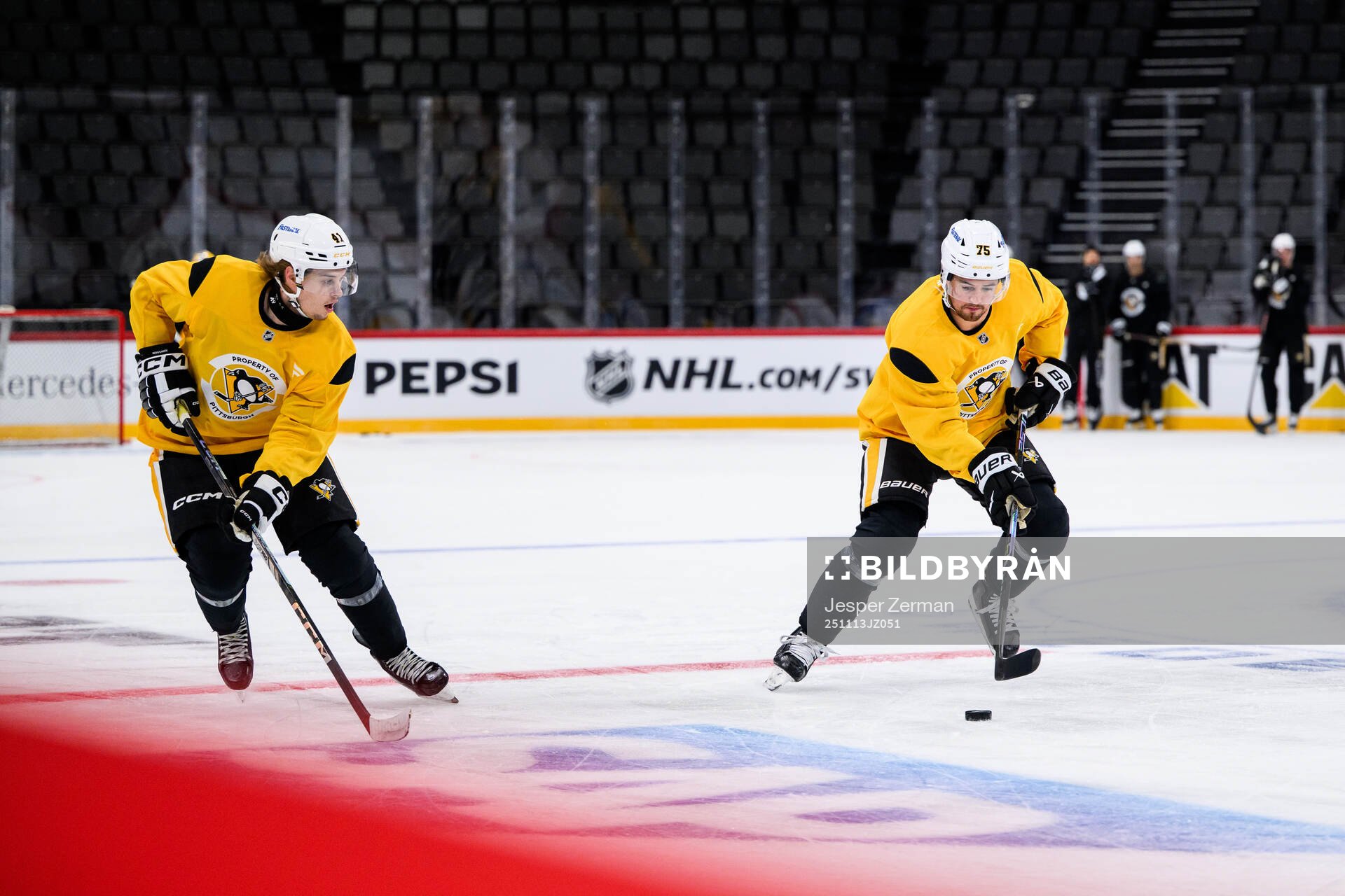 Ville Koivunen and Connor Clifton