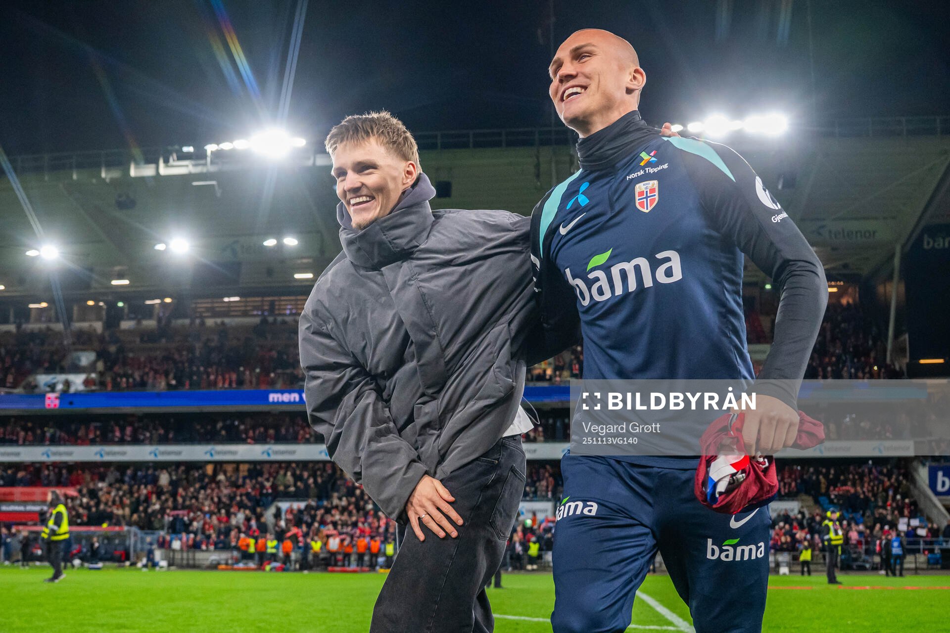 Martin Ødegaard and Leo Østigård of Norway celebrate