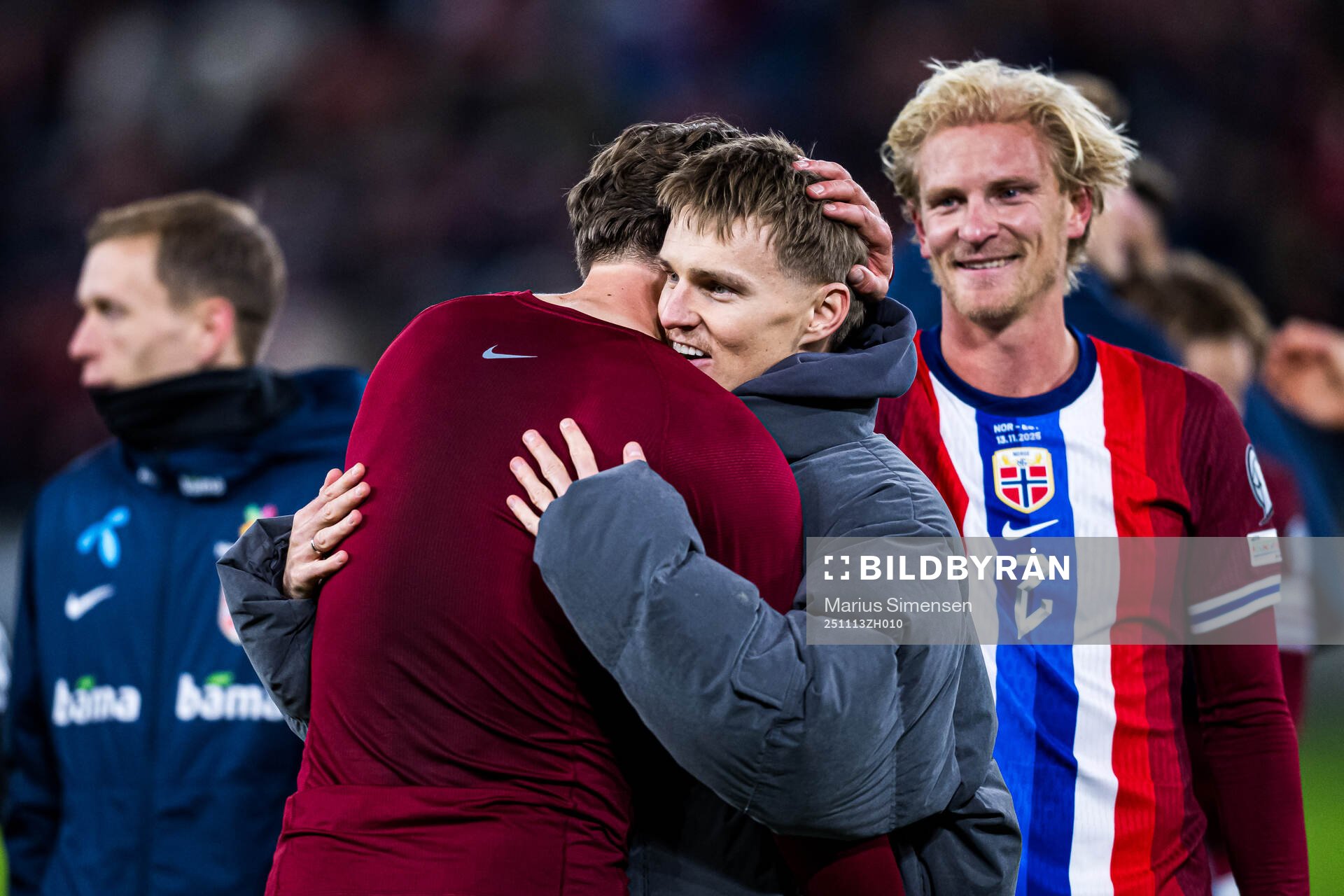 Martin Ødegaard of Norway celebrates with Sander Berge
