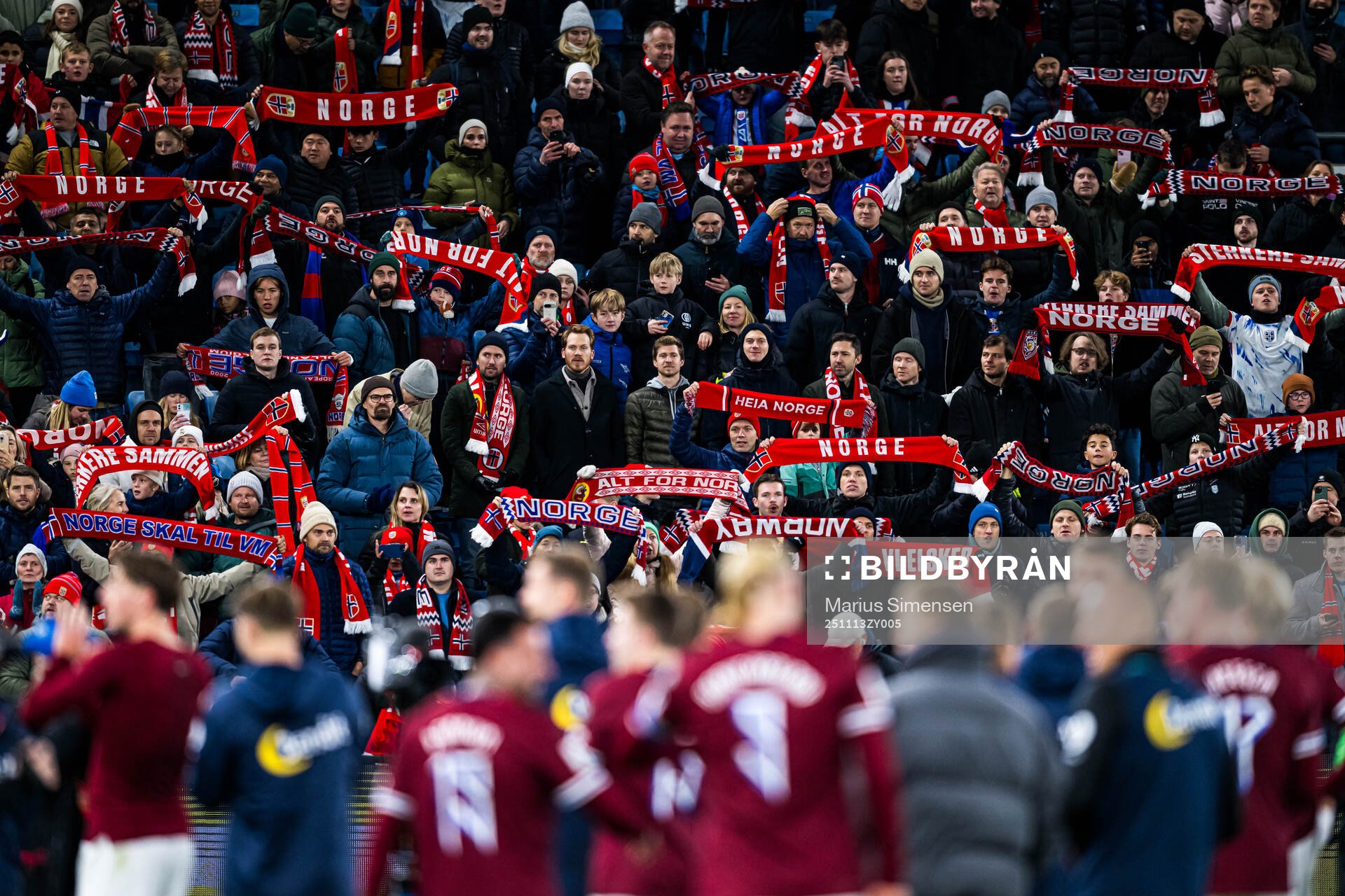 Spectators in the stands celebrates