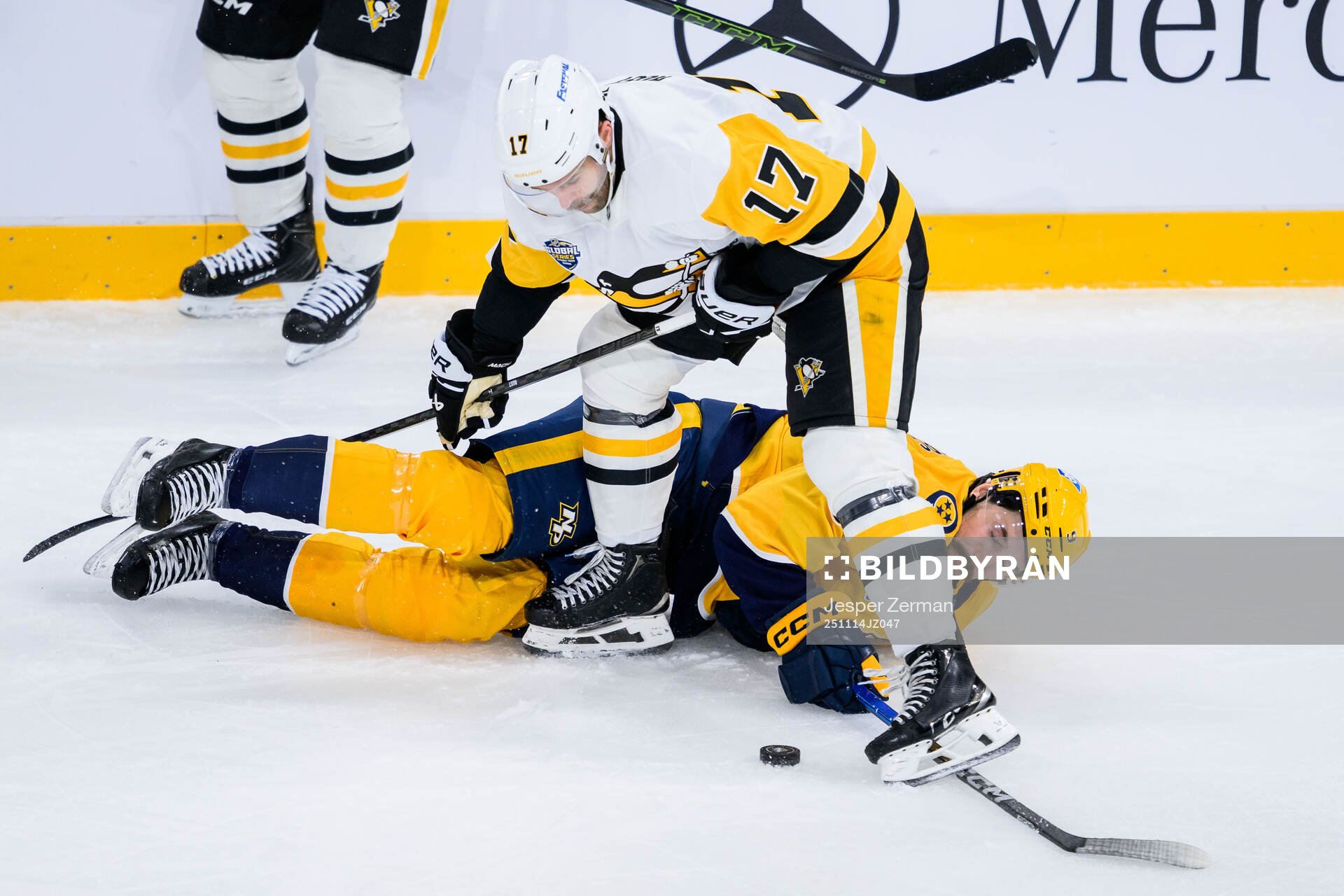 Bryan Rust of Pittsburgh Penguins and Filip Forsberg of