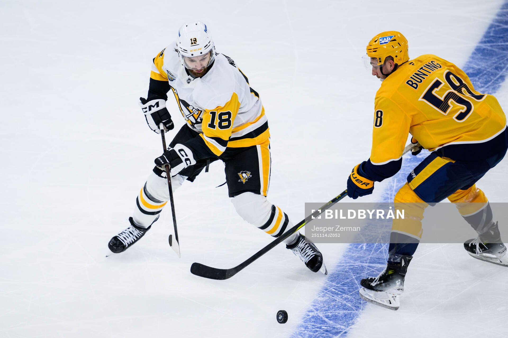 Tommy Novak of Pittsburgh Penguins and Michael Bunting of