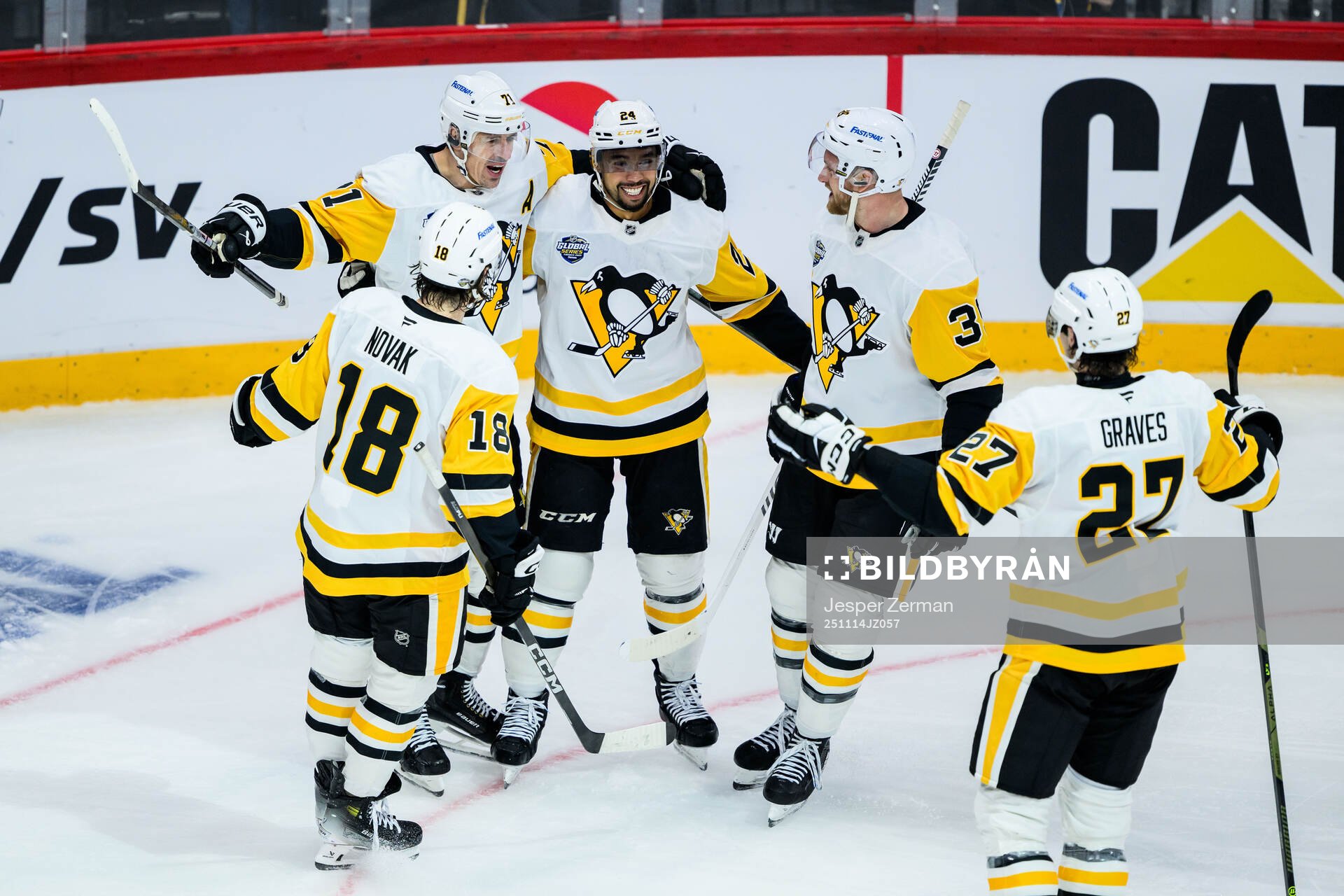 Evgeni Malkin celebrate with Tommy Novak and Mathew Dumba