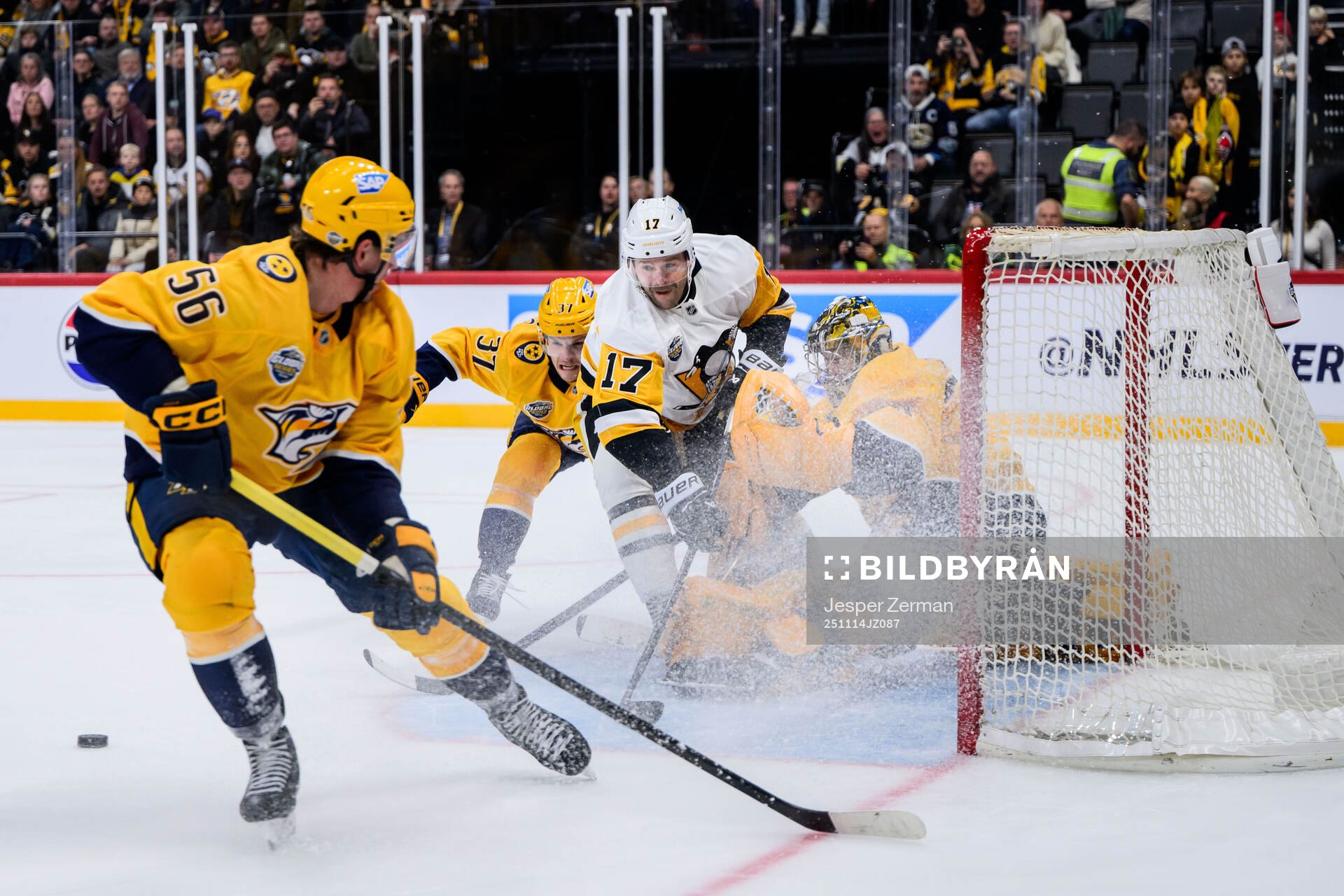 Bryan Rust of Pittsburgh Penguins against Erik Haula, Nick
