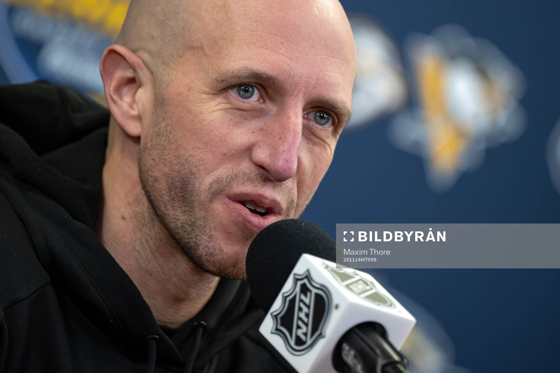 Head coach Dan Muse at a press conference