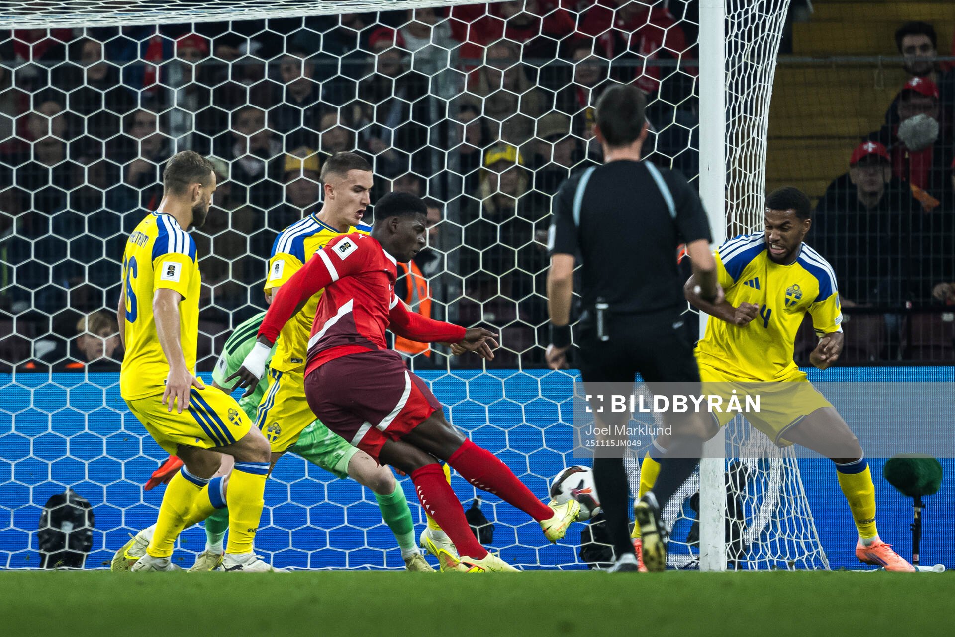 Breel Embolo of Switzerland scores the 1-0