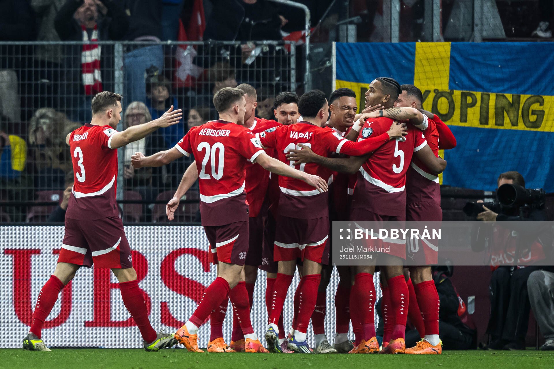Players of Switzerland celebrate the 1-0 goal by Breel