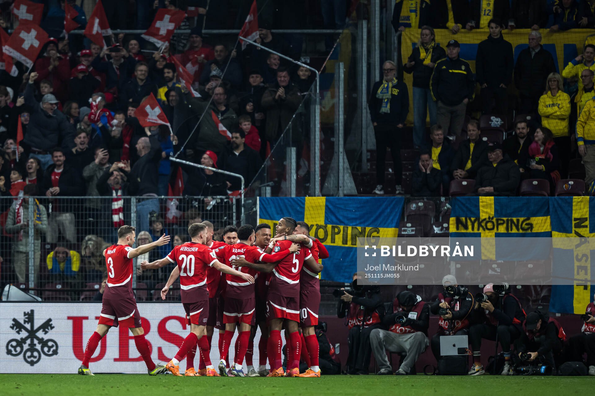 Players of Switzerland celebrate the 1-0 goal by Breel